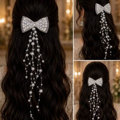 Rhinestone Bow with Long Pearl Strand Tassels